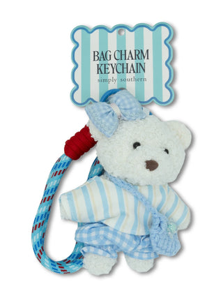 Simply Southern plush bag charm in blue stripe with Simply Southern logo