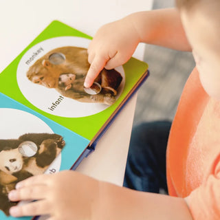 Melissa & Doug Poke-a-Dot Wild Animal Families interactive board book