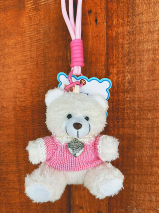 Simply Southern plush bag charm with pearl necklace design and Simply Southern logo