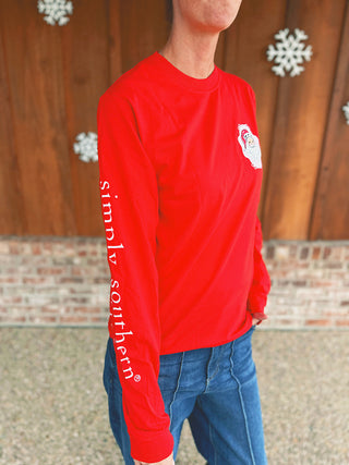 Simply Southern red Believe Santa peppermint long sleeve tee, modeled by an A Gathering Place team member, view 3