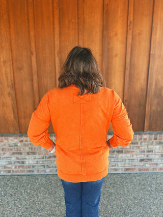 Zenana orange French terry pullover, back view