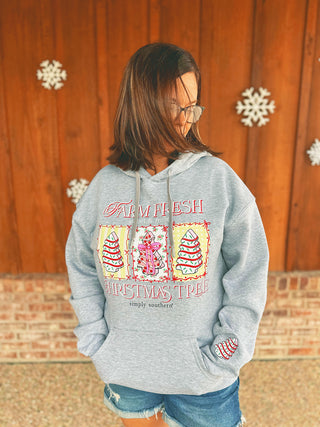 Simply Southern Tree Cake hoodie in heather gray, modeled by an A Gathering Place team member, view 2