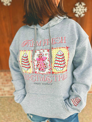 Simply Southern Tree Cake hoodie in heather gray, modeled by an A Gathering Place team member