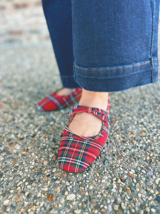 Corky's Layover red plaid Mary Jane slip-on shoes with bow, modeled by an A Gathering Place team member