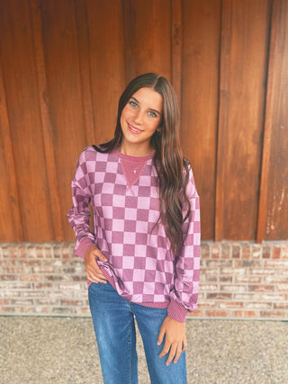 Violet checkered long sleeve top with ribbed cuffs