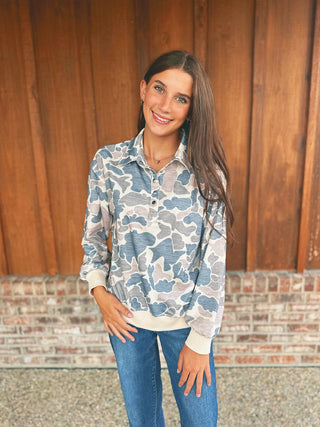 Camouflage print pullover with quarter snap button collar