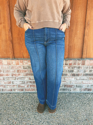 Zenana wide leg pintuck jeans on an A Gathering Place team member, alternate view