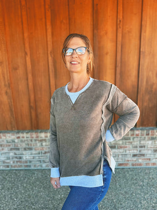 Zenana fleece contrast trim pullover in mocha, modeled by an A Gathering Place team member