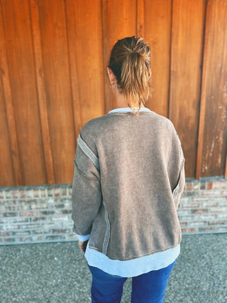 Zenana fleece contrast trim pullover in mocha, modeled by an A Gathering Place team member, view 2