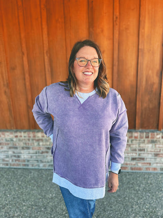 Zenana fleece contrast trim pullover in light eggplant, modeled by an A Gathering Place team member