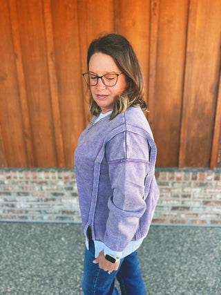 Zenana fleece contrast trim pullover in light eggplant, modeled by an A Gathering Place team member, view 2