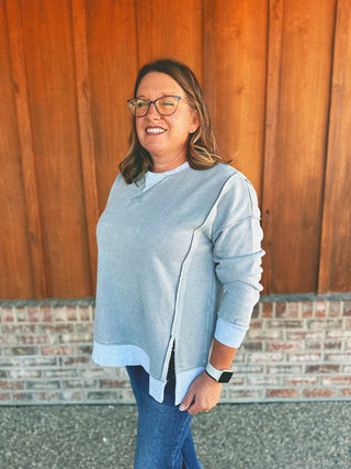 Zenana fleece contrast trim pullover in sleet, modeled by an A Gathering Place team member
