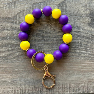 Jillian Ink Game Day Wristlet Keychain Purple Yellow