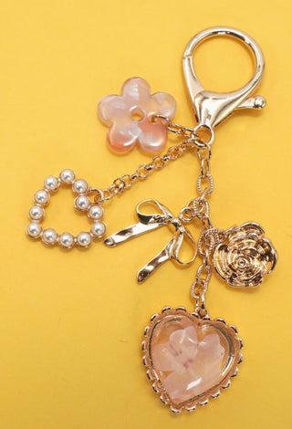Josslyn Pressed Flower Bow Pearl Heart Bag Charm Gold