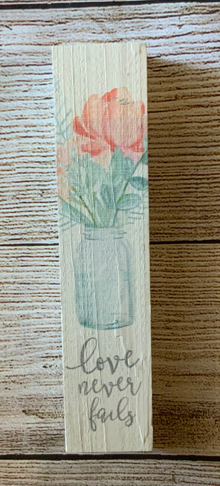 Love Never Fails Wood Block Sign